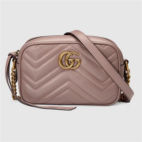 gucci marmont small ราคาช็อปไทย|กระเป๋า GG Marmont mini bag inหนังสีขาว .